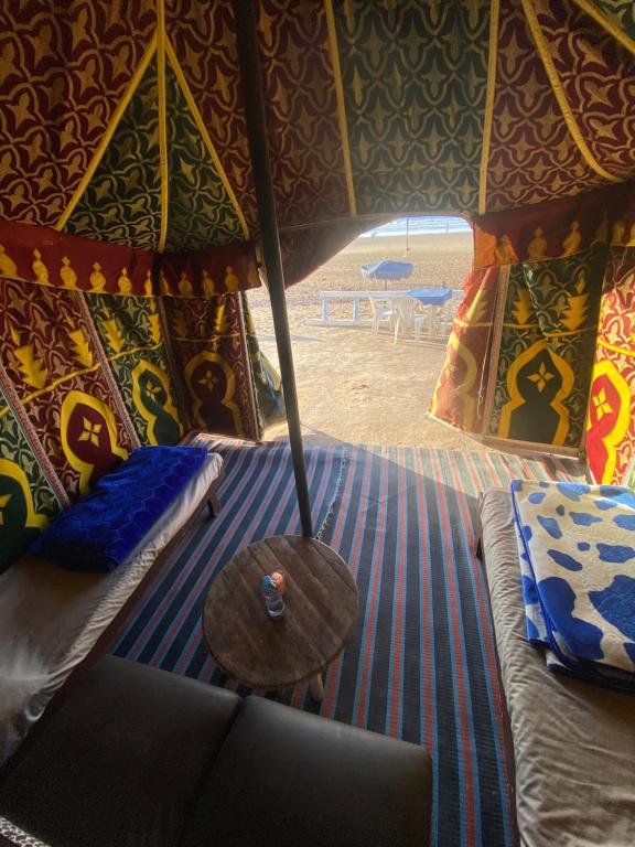 Postel nebo postele na pokoji v ubytování Nomadic Beachcamp