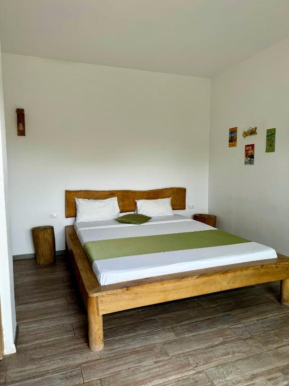 Postel nebo postele na pokoji v ubytování La Base Hotel