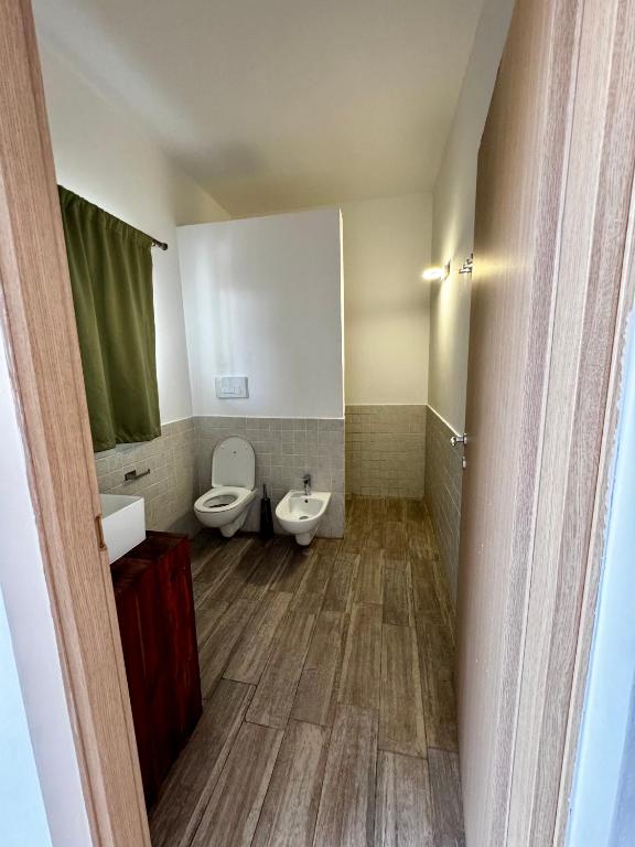 Koupelna v ubytování La Base Hotel