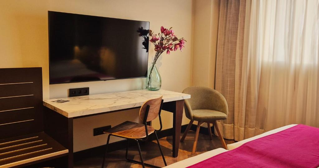 Una televisión o centro de entretenimiento en Vértice Sevilla Aljarafe