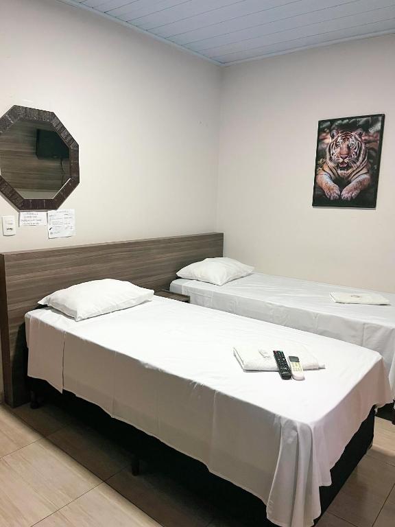 Postel nebo postele na pokoji v ubytování Hotel ROF