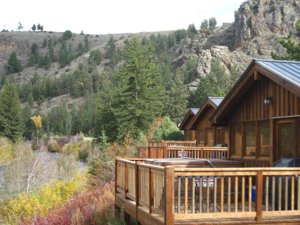 a log cabin with a view of a mountain at Cabin 20 in Almont