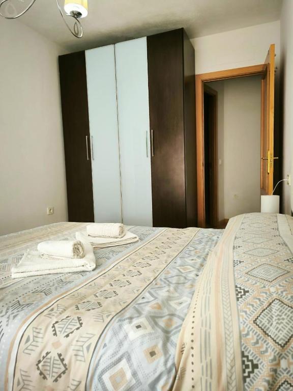 Łóżko lub łóżka w pokoju w obiekcie Apartamento Padial