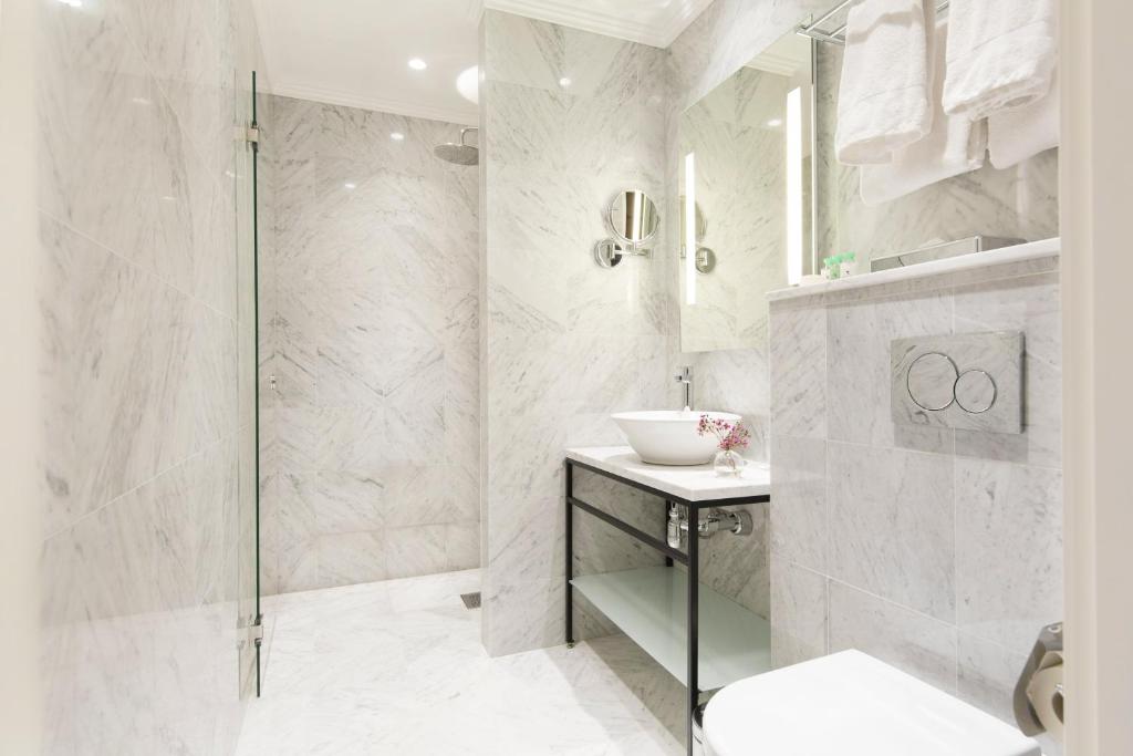 Koupelna v ubytování Elite Hotel Adlon