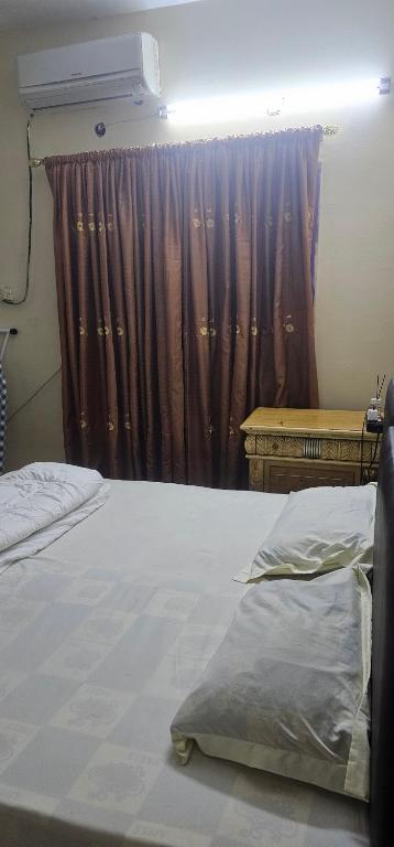 Postelja oz. postelje v sobi nastanitve Room Roola Cournich
