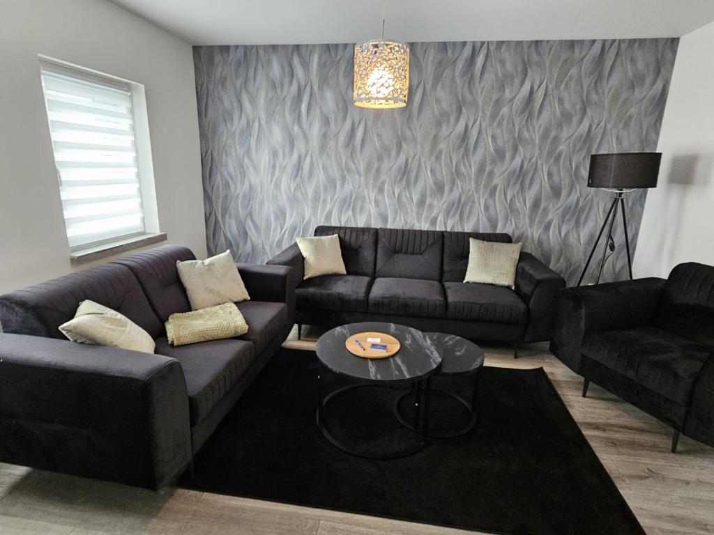 Posezení v ubytování Bördeapartment am Heiderand 2