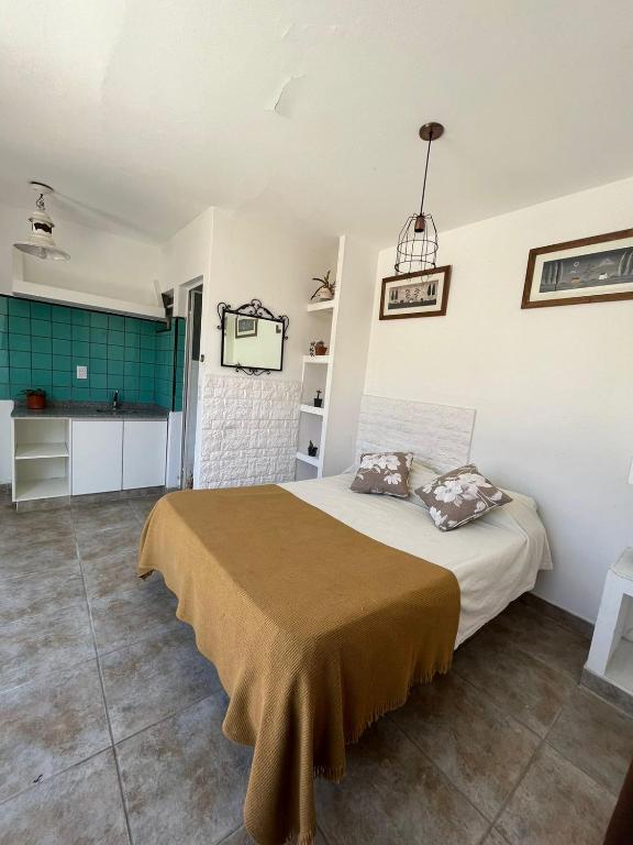 Postel nebo postele na pokoji v ubytování Rincon Salteño Hostel