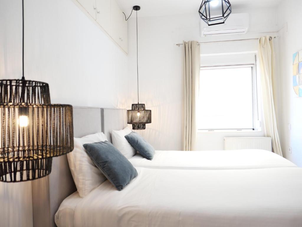 Кровать или кровати в номере Chania Locals Flat