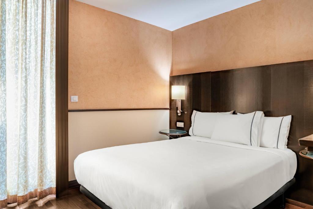 Postel nebo postele na pokoji v ubytování AC Hotel Ciudad de Tudela by Marriott