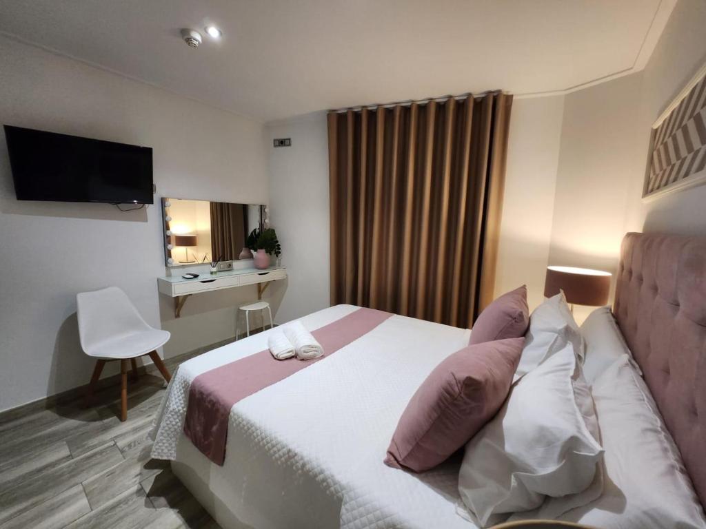 Postel nebo postele na pokoji v ubytování DON LEONE Hotel