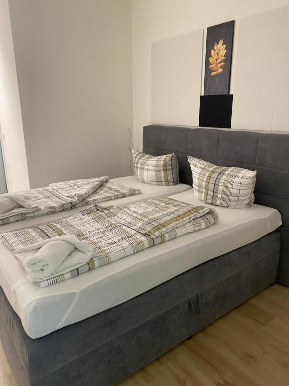 Ένα ή περισσότερα κρεβάτια σε δωμάτιο στο Goldstar Hotel Hannover