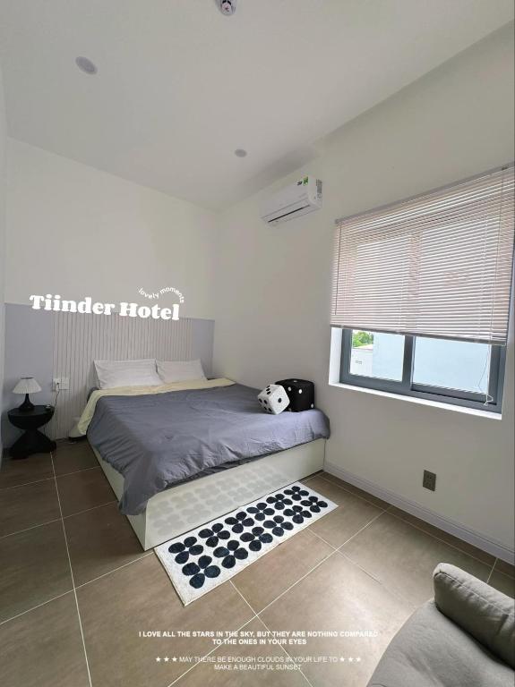 Postel nebo postele na pokoji v ubytování Tiinder Hotel