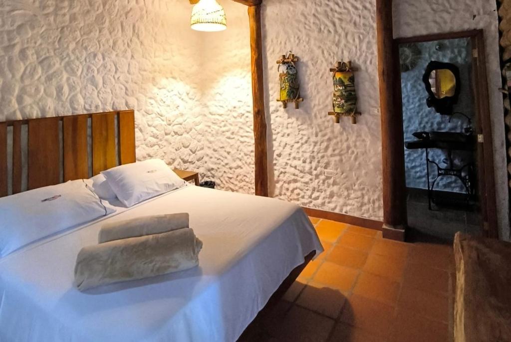 Postel nebo postele na pokoji v ubytování Costello Campestre