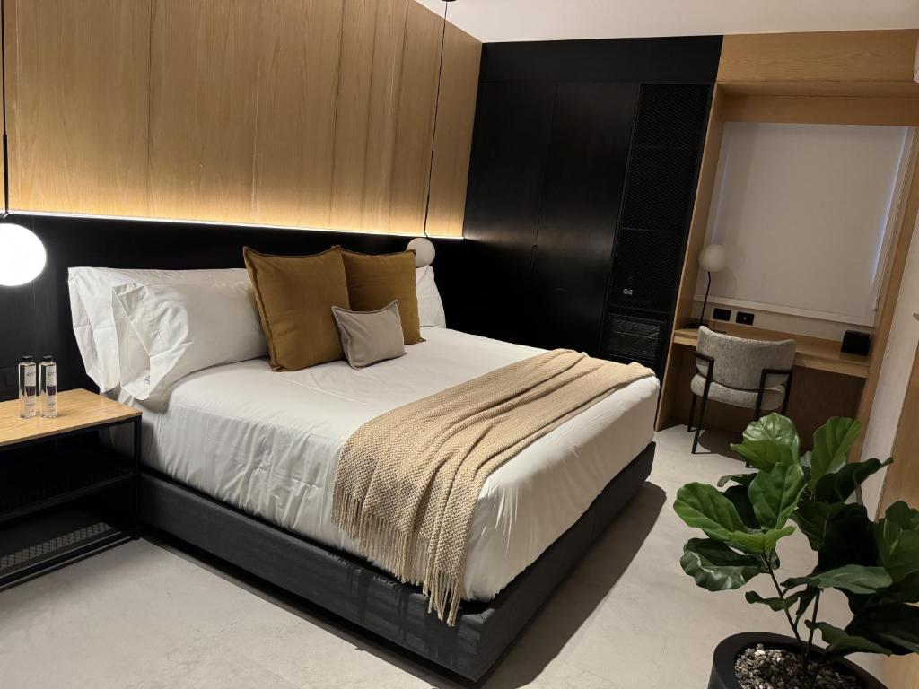 Postel nebo postele na pokoji v ubytování Hotel Aló Degollado