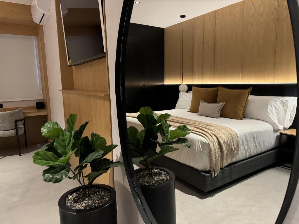 Postel nebo postele na pokoji v ubytování Hotel Aló Degollado