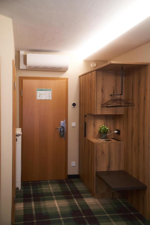 Kuchyň nebo kuchyňský kout v ubytování Hotel Restaurant Erber