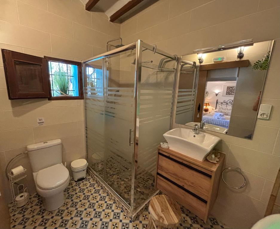 a bathroom with a shower and a toilet and a sink at Hotel Altea Paradise 1917 - Adults Only in Altea