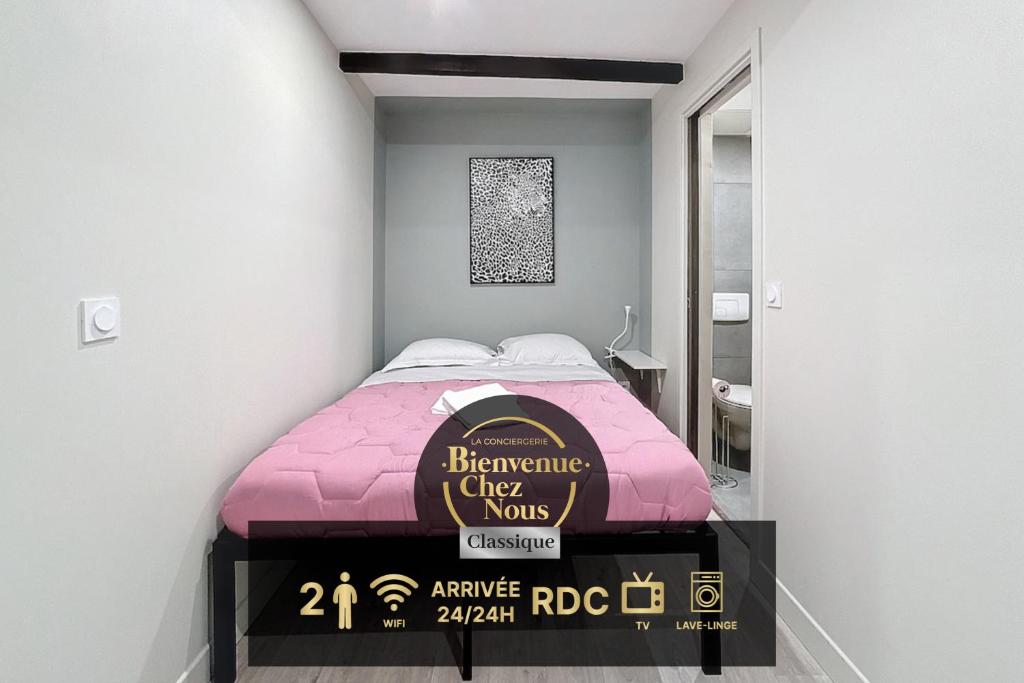 En eller flere senge i et værelse på Appartement tout neuf 4 pers N6