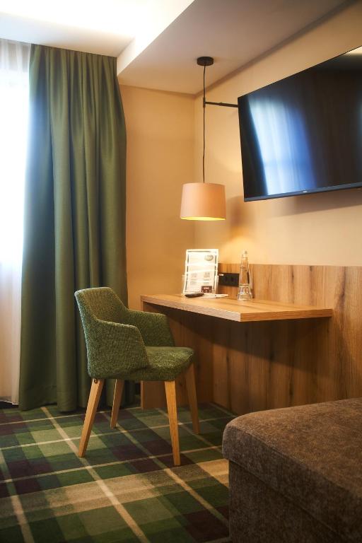 TV a/nebo společenská místnost v ubytování Hotel Restaurant Erber