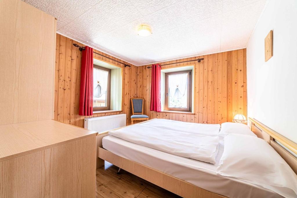 Postel nebo postele na pokoji v ubytování Appartamento Vecchia Osteria