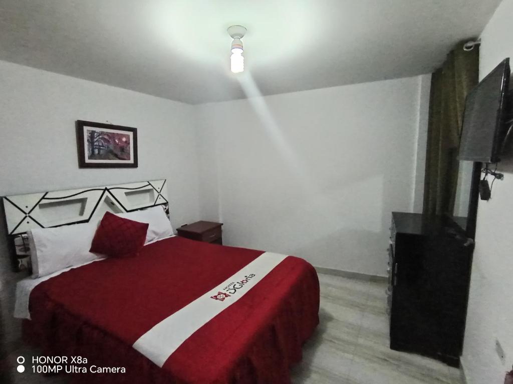 Postel nebo postele na pokoji v ubytování Hotel D'Gloria