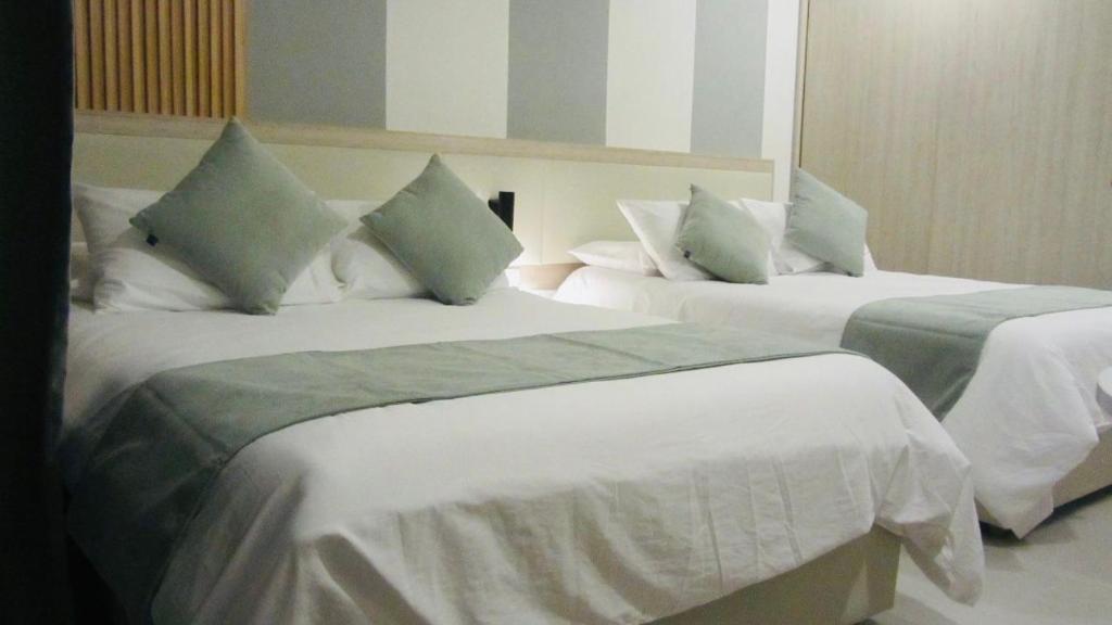 Postel nebo postele na pokoji v ubytování Porto Horizonte SUITE 904