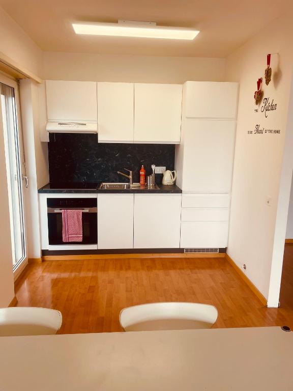 Kuchyň nebo kuchyňský kout v ubytování Appartamenti da sogno