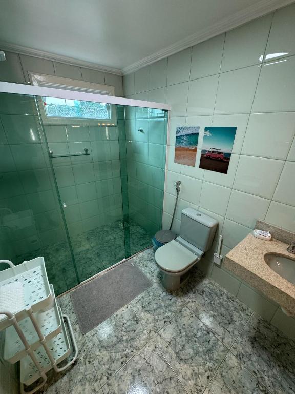 Koupelna v ubytování Casa Rosa Suítes 5 min de caminhada da PRAIA DA PONTA NGRA