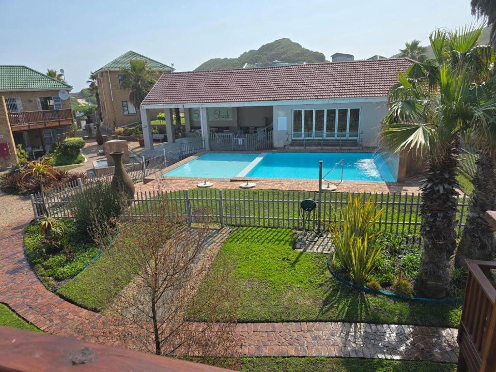 a house with a swimming pool in a yard at Sedgefield in Sedgefield