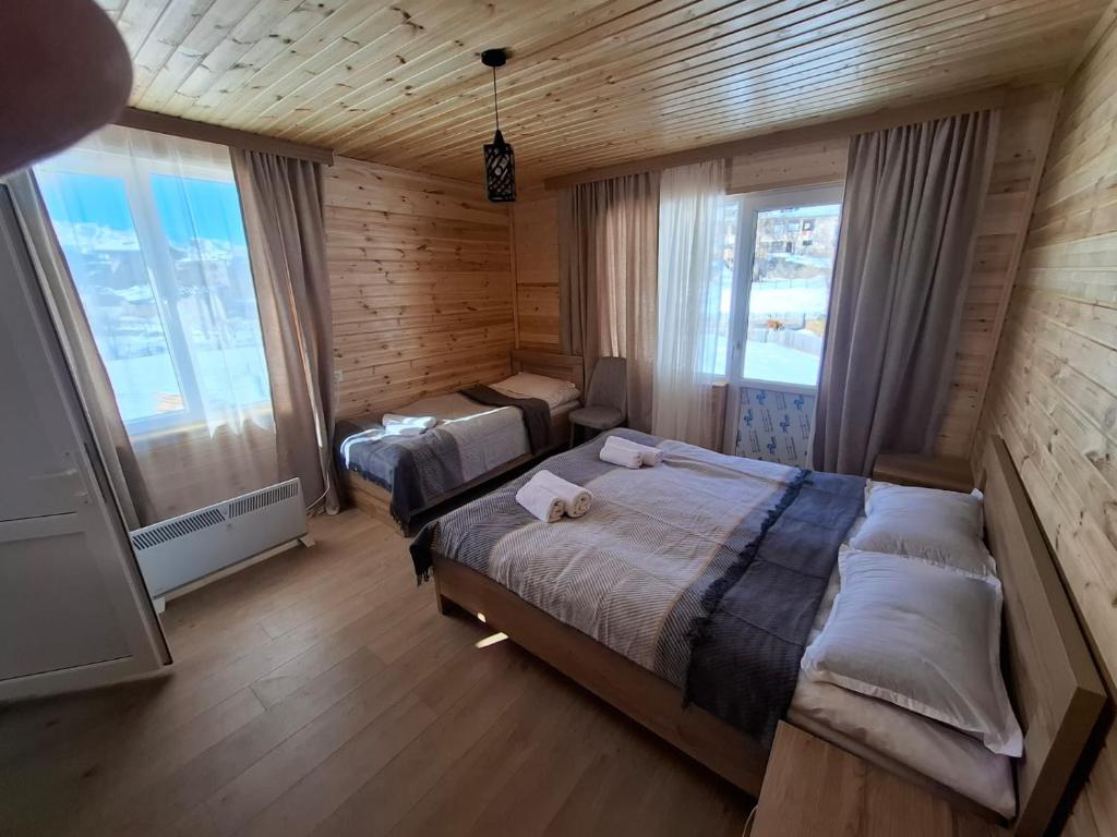 Postel nebo postele na pokoji v ubytování Mountain house in Mestia