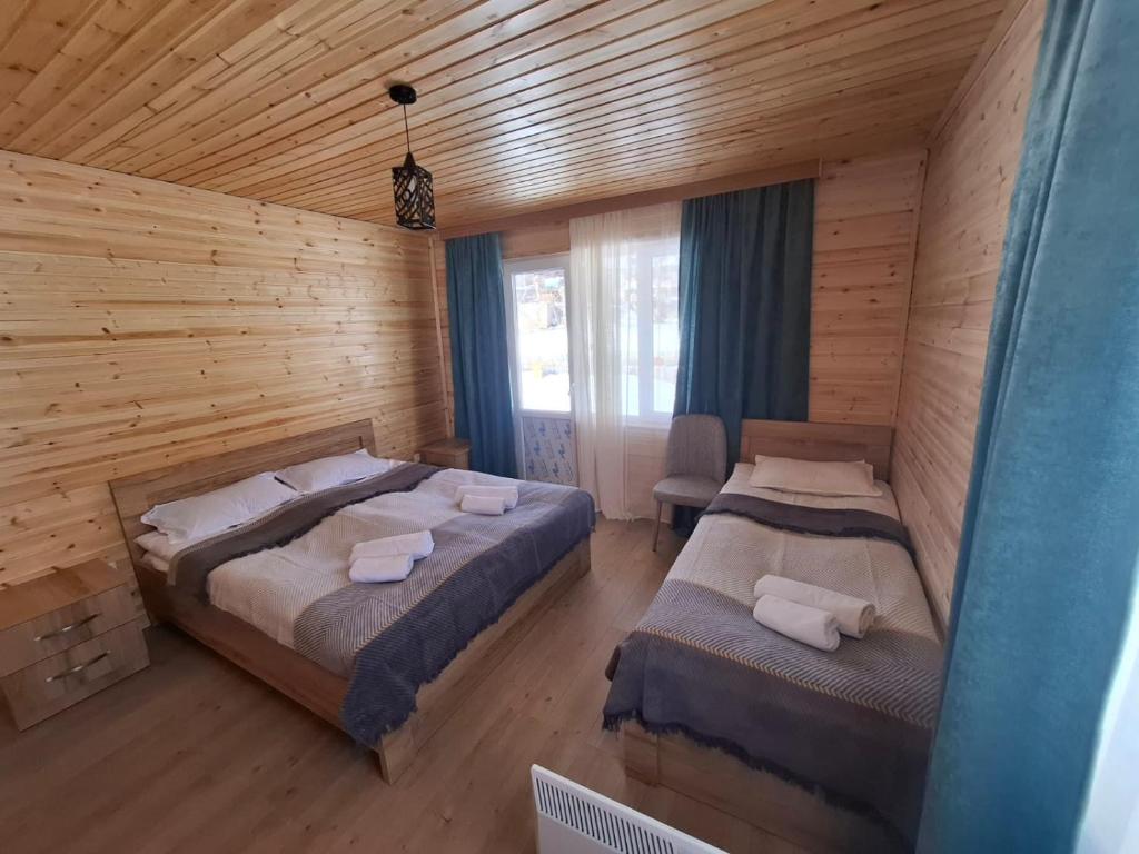 Postel nebo postele na pokoji v ubytování Mountain house in Mestia