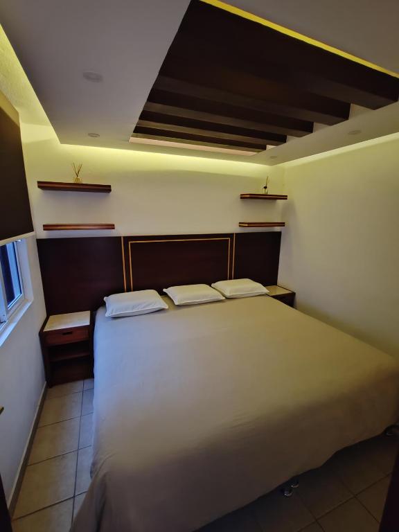 Postel nebo postele na pokoji v ubytování Posada Castillo