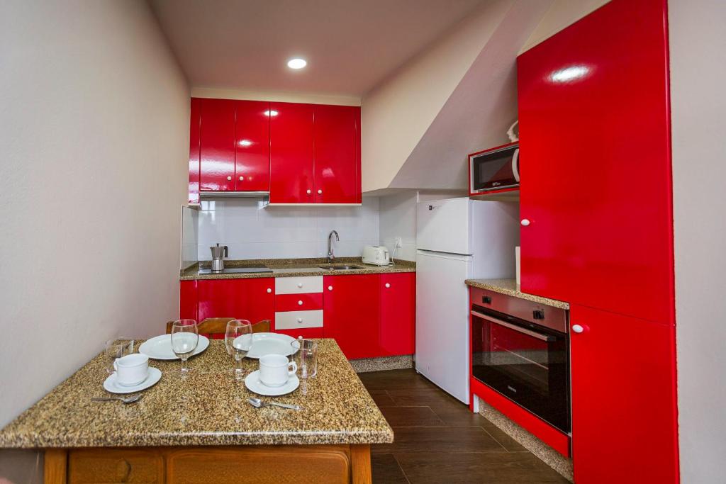 Kuchyňa alebo kuchynka v ubytovaní Apartamentos Currás en Touriñán