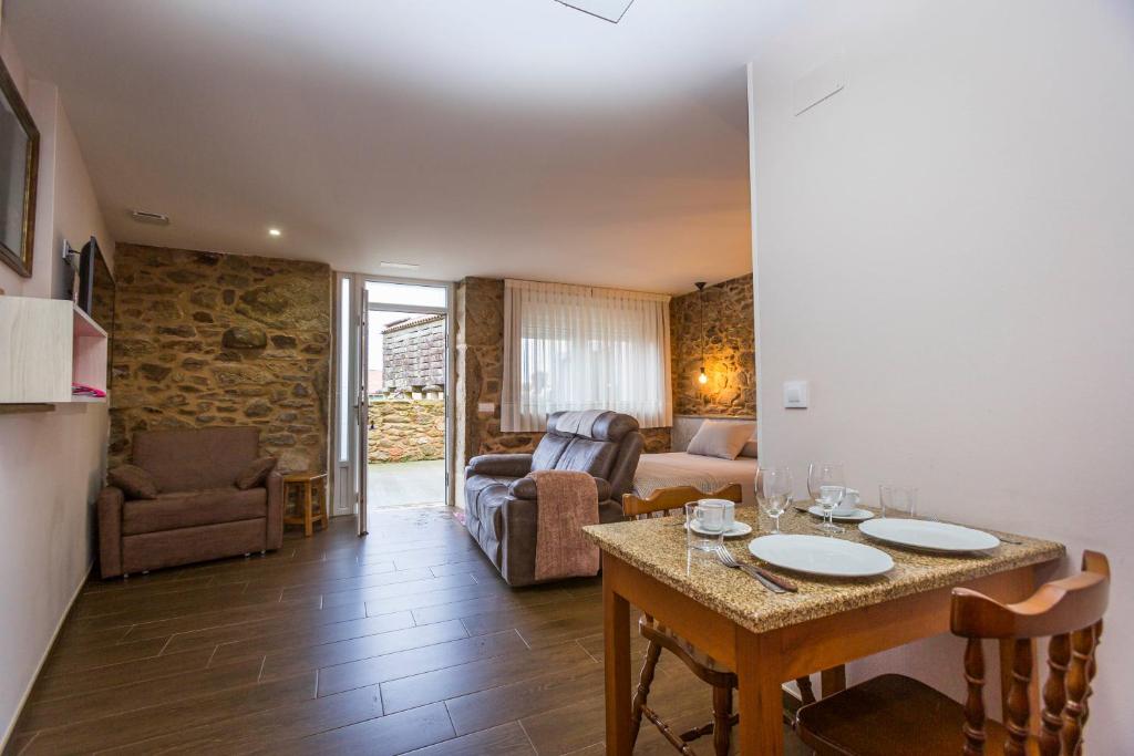 Posedenie v ubytovaní Apartamentos Currás en Touriñán