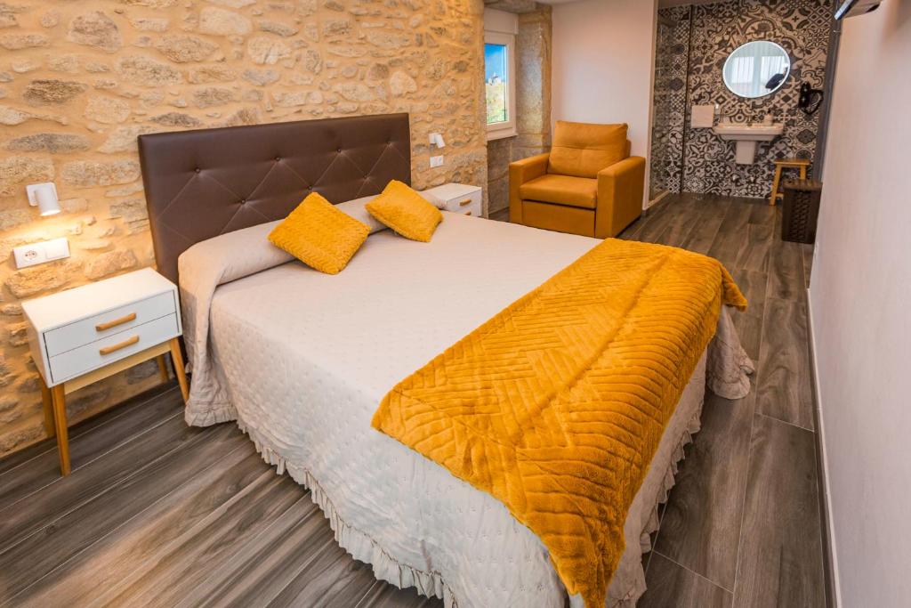 Posteľ alebo postele v izbe v ubytovaní Apartamentos Currás en Touriñán