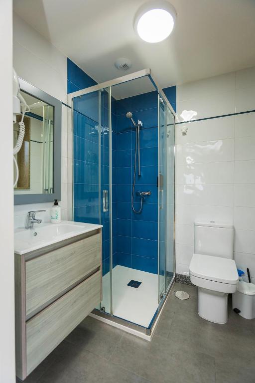 Kúpeľňa v ubytovaní Apartamentos Currás en Touriñán