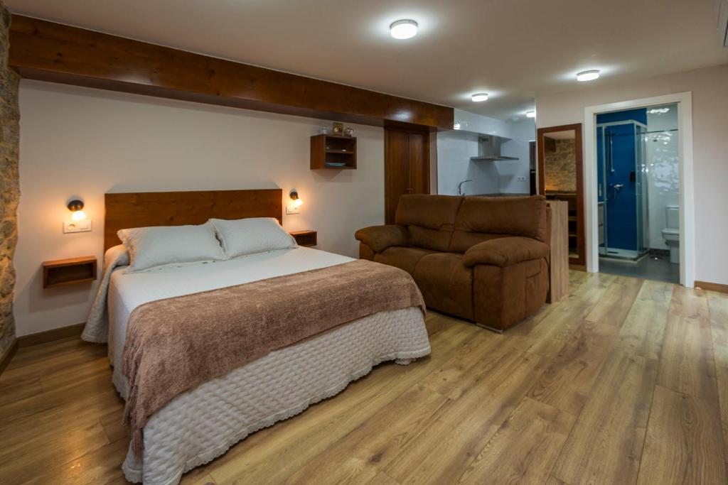 Posteľ alebo postele v izbe v ubytovaní Apartamentos Currás en Touriñán