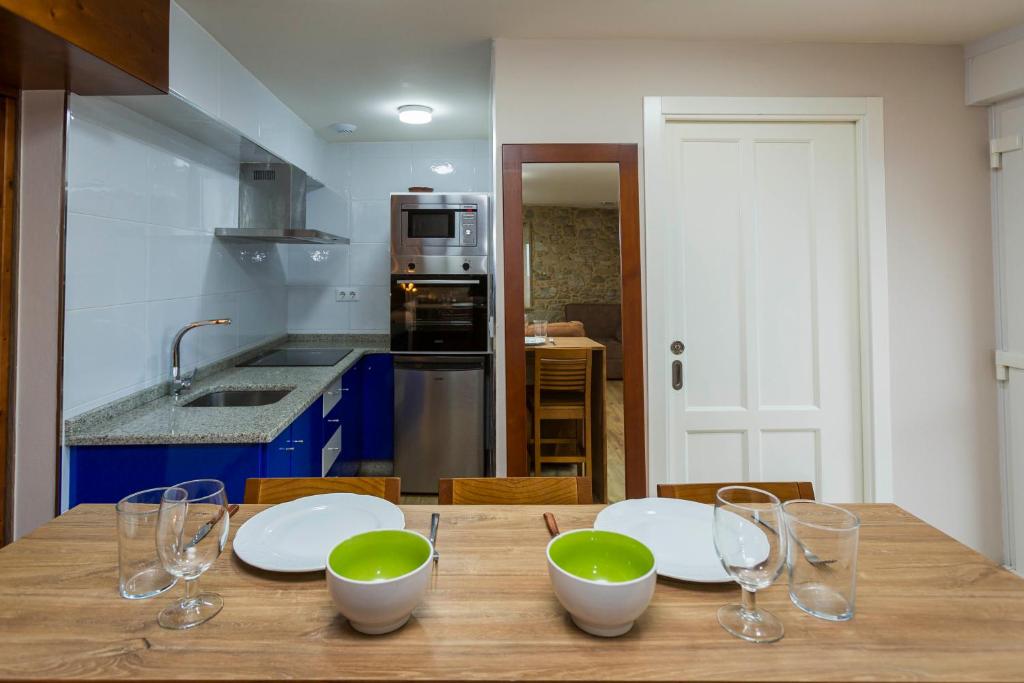 Kuchyňa alebo kuchynka v ubytovaní Apartamentos Currás en Touriñán