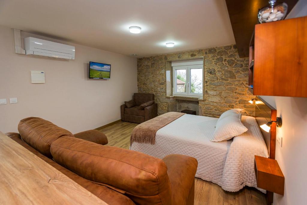 Posteľ alebo postele v izbe v ubytovaní Apartamentos Currás en Touriñán