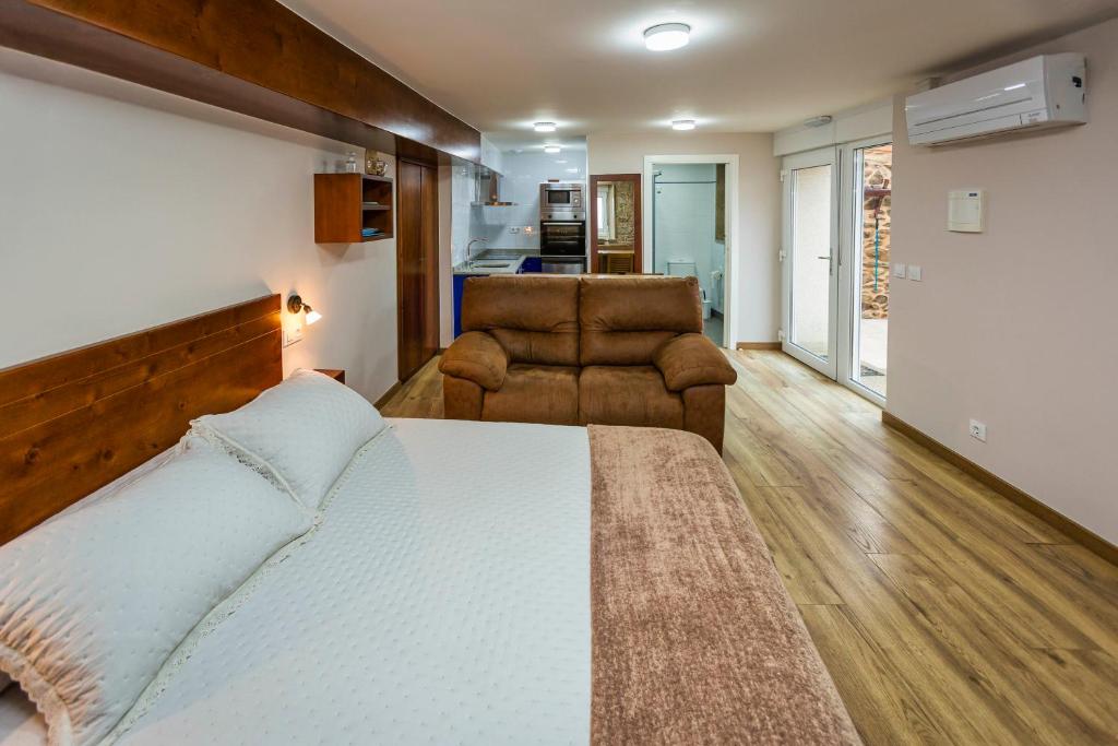Posedenie v ubytovaní Apartamentos Currás en Touriñán