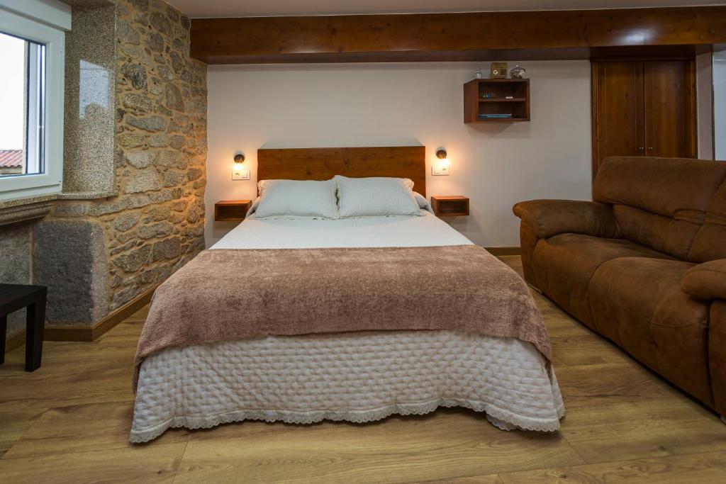 Posteľ alebo postele v izbe v ubytovaní Apartamentos Currás en Touriñán