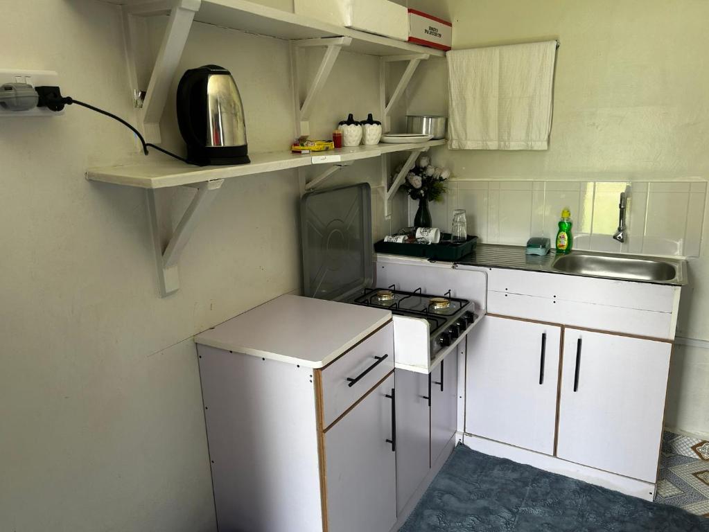 Kuchyň nebo kuchyňský kout v ubytování Jymia BnB