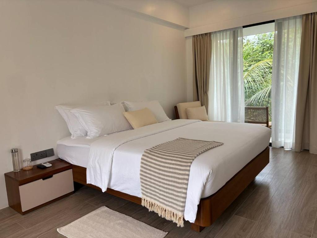 Postel nebo postele na pokoji v ubytování Kinbi Private Villa - Goidhoo