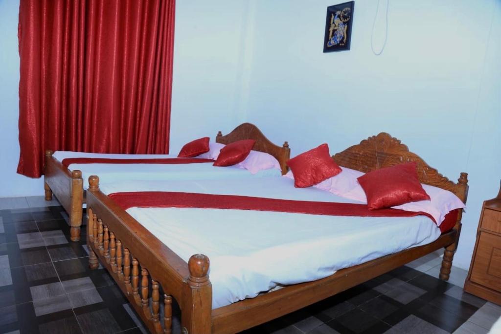 Postel nebo postele na pokoji v ubytování Pearl Rest