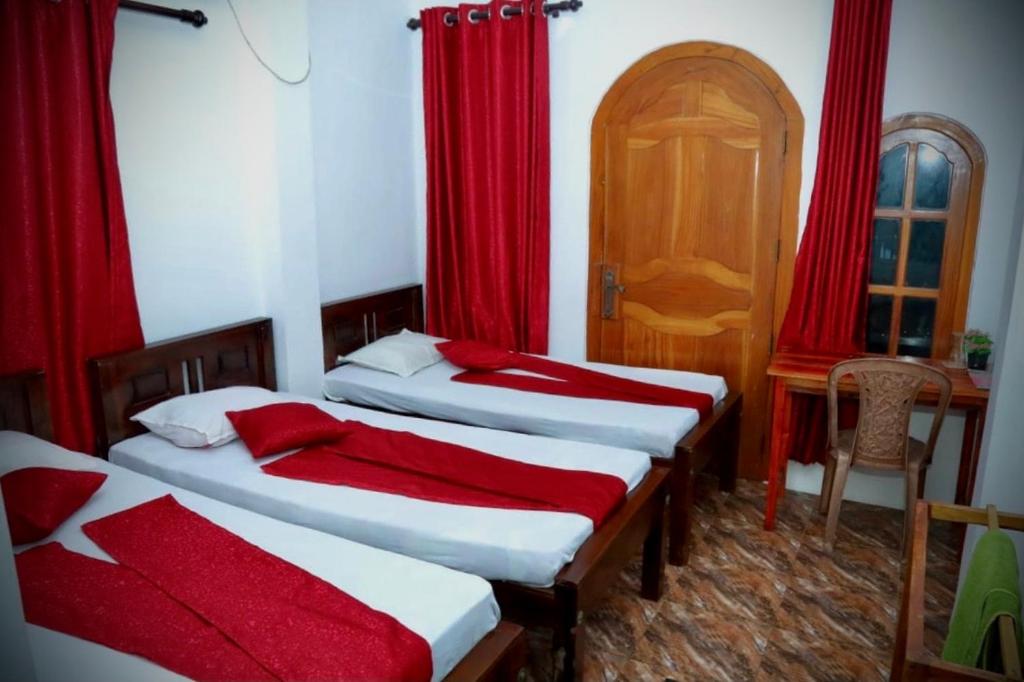 Postel nebo postele na pokoji v ubytování Pearl Rest