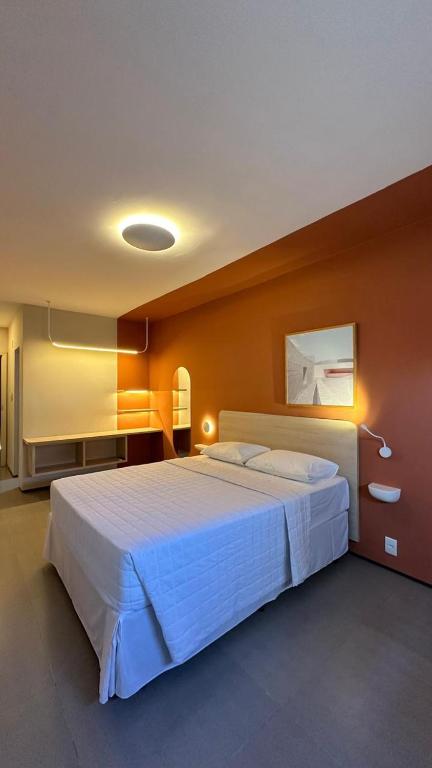 Postel nebo postele na pokoji v ubytování Hotel São Domingos