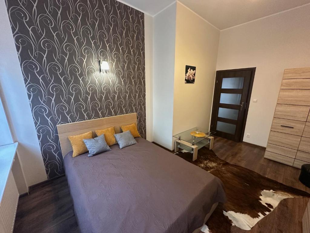 Posteľ alebo postele v izbe v ubytovaní Gdańskie Apartamenty - Apartamenty na Świetego Ducha z 2 sypialniami