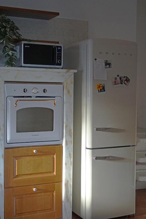Kuchyň nebo kuchyňský kout v ubytování Coliving Together Gargano