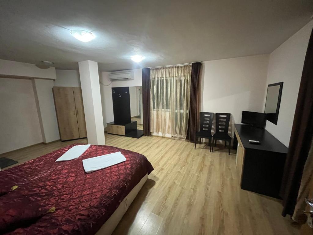 Postel nebo postele na pokoji v ubytování Hotel MERIDA