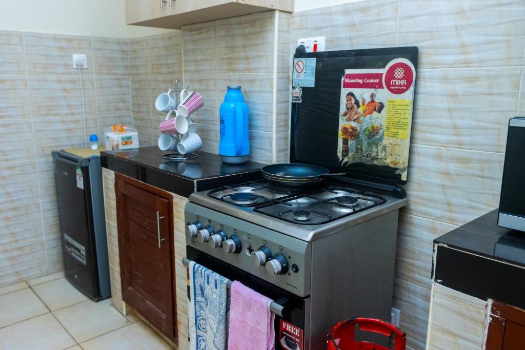 Kuchyň nebo kuchyňský kout v ubytování Bamburi BnB